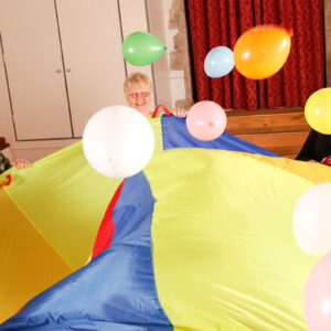 Parachute Games for Chair‑based Exercise